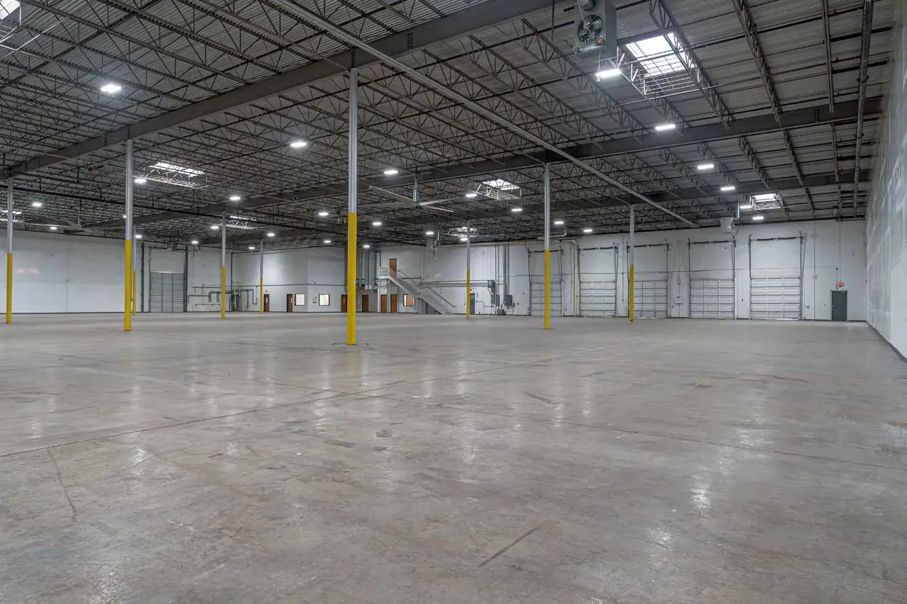 Brightly lit commercial warehouse interior